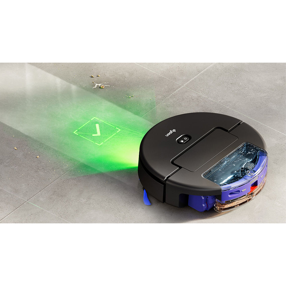 Dyson Spot+Scrub AI robot vacuum in black with blue accents on tile floor, displaying green laser navigation pattern and checkmark symbol