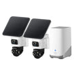 Two solar-powered security cameras with a central device on a white background