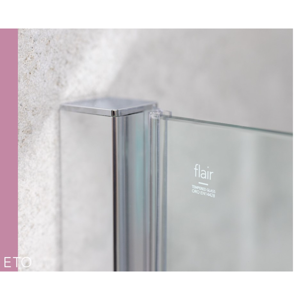 Close-up detail of Flair ETO chrome sliding shower door frame with tempered glass panel against white textured tile wall, showcasing modern minimalist design with polished metal profile and clear glass construction
