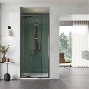 Modern bathroom featuring a Flair ETO Infold shower door with gunmetal frame and green subway tile interior, marble walls, black shower fixtures, and minimalist decor including potted plants and a brown accent chair visible through open space