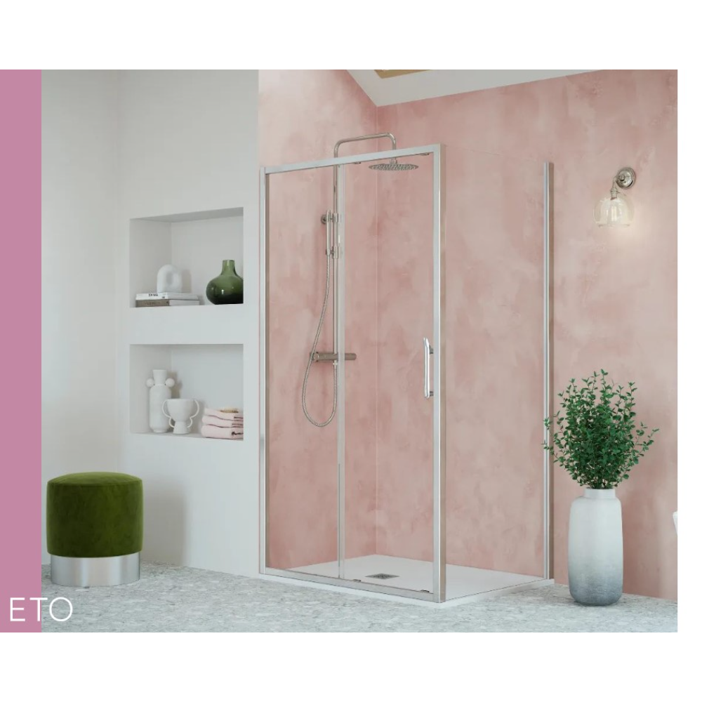 Modern chrome framed sliding shower door in a contemporary bathroom with pink textured walls, white built-in shelving, grey terrazzo flooring, and decorative white vase with green plant