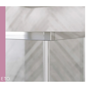 Flair ETO chrome sliding shower door with clear glass panels and metal frame detail against marble tile background
