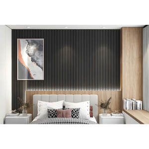 Modern bedroom featuring vertical acoustic wall panels in ebony black with natural wood accents, cream upholstered headboard, geometric patterned bedding, geometric throw pillows, twin white nightstands, and abstract landscape artwork on corrugated wall treatment