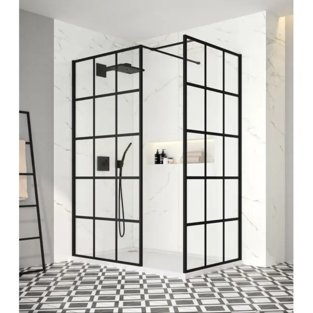 Black framed corner shower enclosure with grid pattern glass panels, marble tile walls, chrome showerhead and handheld spray, modern wetroom design