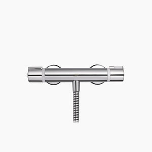 Mira Relate exposed bar mixer shower in polished chrome with dual circular handles and coiled hose connection