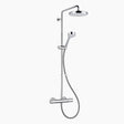 Chrome finished dual shower head with control on a white backgorund