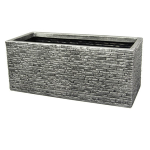 Grey stone slate rectangular garden planter trough with textured brick pattern finish and black plastic liner insert