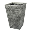 Tall rectangular garden planter pot with stacked slate stone brick pattern exterior in grey and charcoal tones, featuring tapered sides and open top with black interior liner