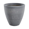 Large ash gray textured concrete garden planter pot with tapered cylindrical design and horizontal ribbed surface pattern