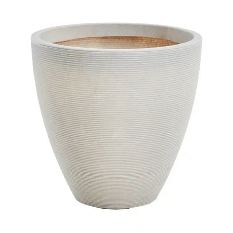 Large stone garden planter with textured horizontal ridged finish in cream white color, tapered cylindrical shape with terracotta interior rim, suitable for outdoor use
