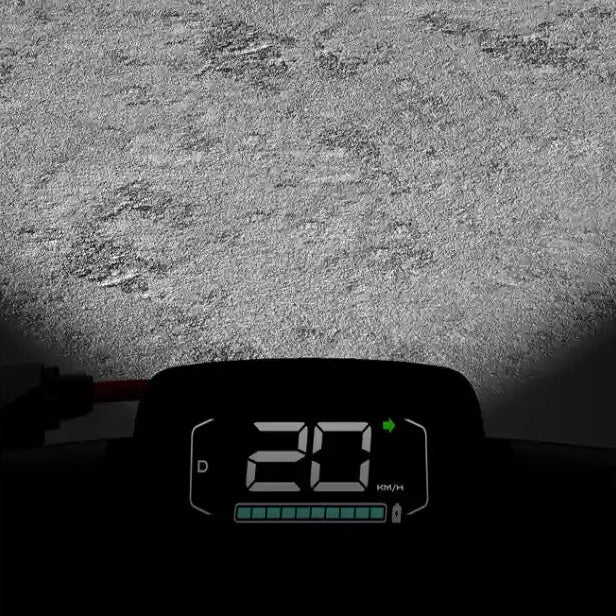 Digital speedometer display of Segway Ninebot Kickscooter E3 Pro showing 20 km/h speed reading on asphalt ground surface