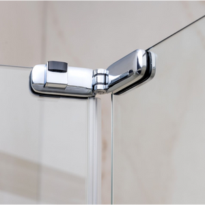 Close-up of a chrome and matt black bifold shower door hinge and frame detail showing polished metal hardware and white frame profile against neutral bathroom tiles