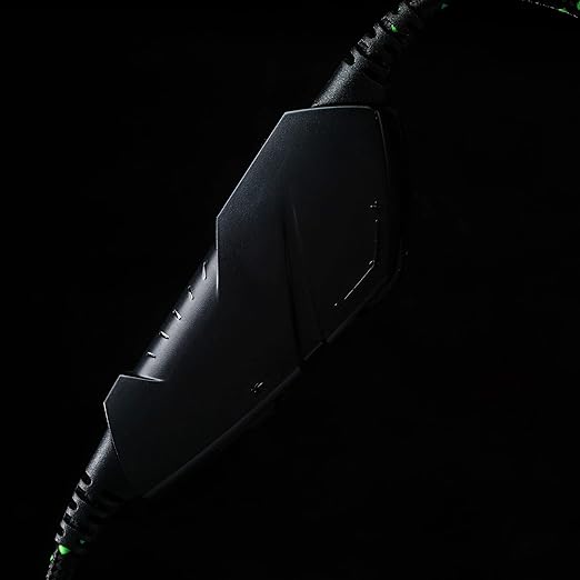 Intempo gaming headset with mic in black and green, shown against black background with illuminated cable connector detail