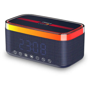 Red Bull Racing RB-SK300 Bluetooth speaker with dark blue fabric body, orange and yellow gradient top panel, red accents, and control buttons including play, skip, and volume controls on the front