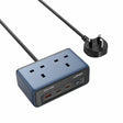 Ldnio 5 in 1 desktop power strip with blue top panel featuring 6 UK power sockets, black base with USB and USB-C ports, and attached black UK plug cable