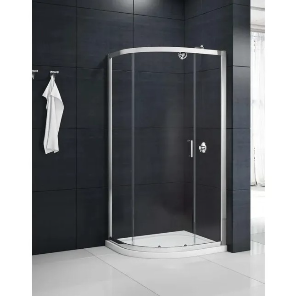 Merlyn MBox quadrant shower enclosure with chrome frame and clear glass panels in modern bathroom with black tiled walls and white floor tiles