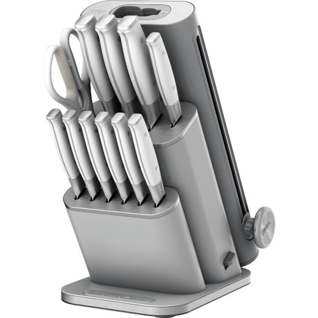 Ninja StaySharp 13 piece knife block set in white and grey featuring multiple kitchen knives arranged in a rotating block with built-in removable sharpener and carrying handle
