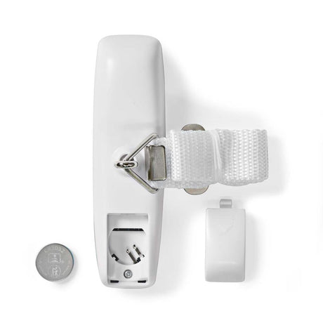 White wall-mounted electrical outlet with a strap and battery on a white background