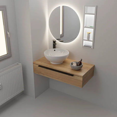 Modern bathroom vanity unit featuring a wall-mounted oak wood cabinet with integrated white ceramic round basin sink, illuminated oval mirror with LED backlighting, black handle detail, matching white shelving unit, and bathroom accessories on natural wood countertop in contemporary minimalist style
