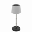 White lamp with black base on a white background