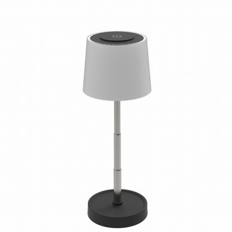 White lamp with black base on a white background