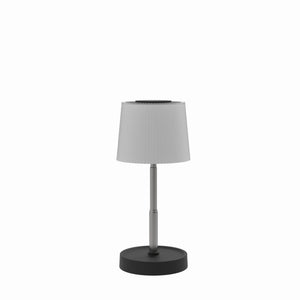 Table lamp with a gray shade and black base on a white background