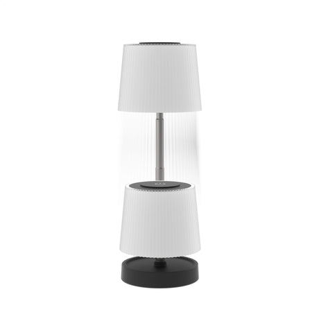 Table lamp with white shade and black base on a white background