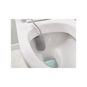 Joseph Joseph Flex grey and white toilet brush with flexible bristles head positioned inside white toilet bowl