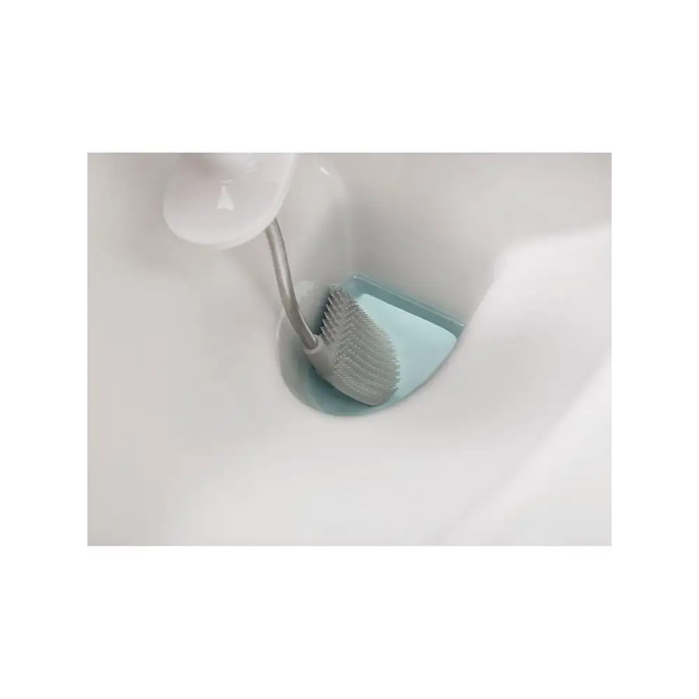 Joseph Joseph Flex Toilet Brush in grey and white with textured brush head and flexible handle stored in light blue holder inside white toilet bowl