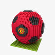 Red and black soccer ball puzzle on a green baseplate with a visible logo.