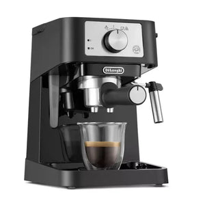 DeLonghi Stilosa black espresso coffee machine with stainless steel portafilter and glass cup, featuring control panel with dial and indicator lights
