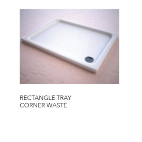 White rectangular acrylic shower tray with corner waste drain positioned on wooden flooring, showing slimline design with raised edges and dark drain outlet visible on lower right corner