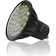 Eveready 3W SMD LED GU10 bulb with warm white light, black plastic housing with multiple yellow LED chips visible on reflective metal base plate, shown at angle against white background with reflection