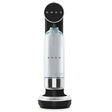 Smeg SKC01BLM sparkling water maker in matte black and stainless steel with clear glass bottle cartridge on white background