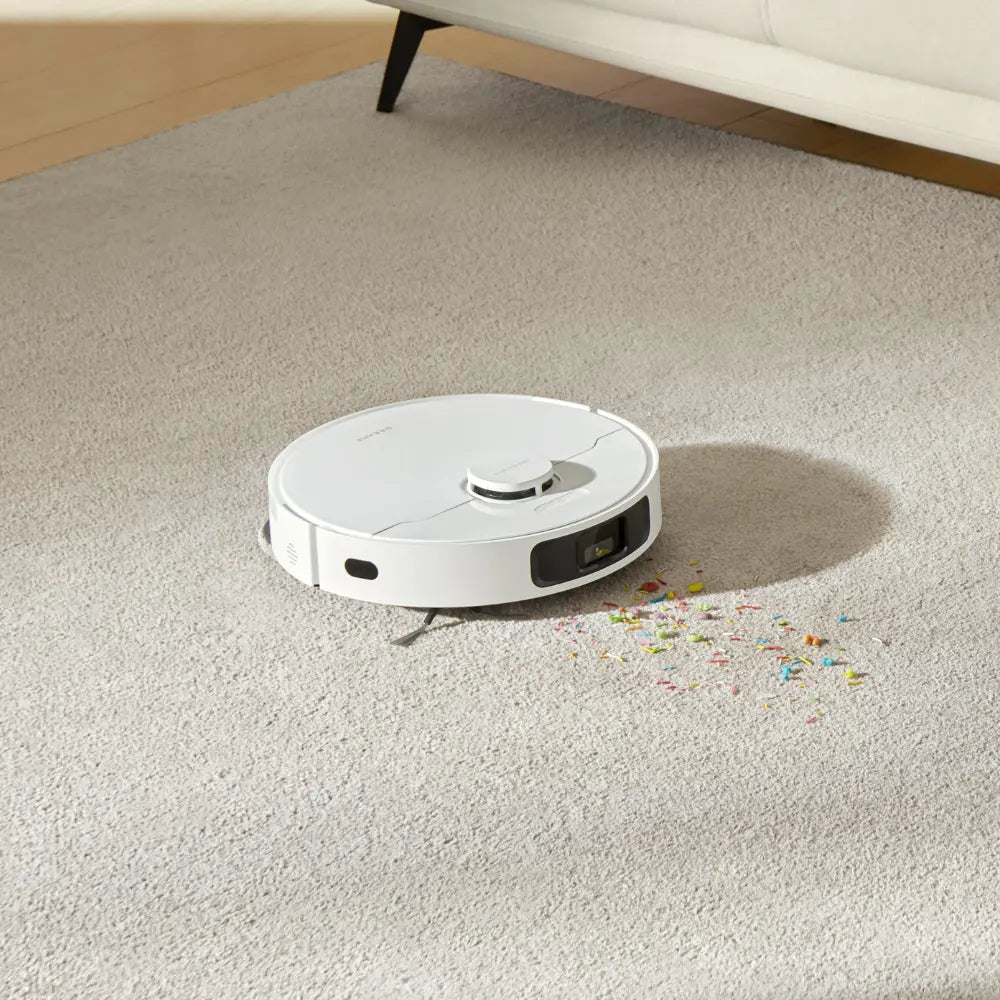 a robot vacuum cleaner on the floor