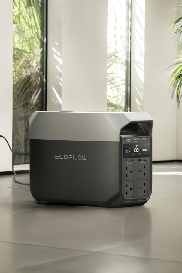 a black and grey rectangular object with multiple outlets