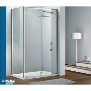 Modern chrome framed sliding shower enclosure with clear glass panels and white base tray in contemporary bathroom setting with grey tiled walls and wooden vanity