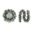 National Tree Company Snowy Stamford 76cm Christmas wreath beside the matching 9ft Snowy Stamford garland, both with frosted green foliage, on a white background