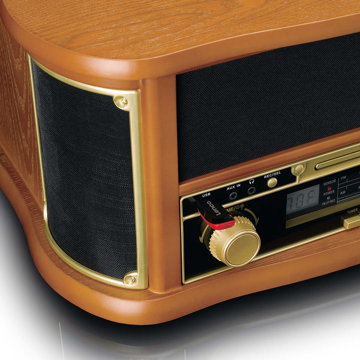Lenco TCD-2551WD 8-in-1 retro turntable with warm wood cabinet, brass trim, black fabric speaker panels, and integrated control panel with tuner display and volume knob