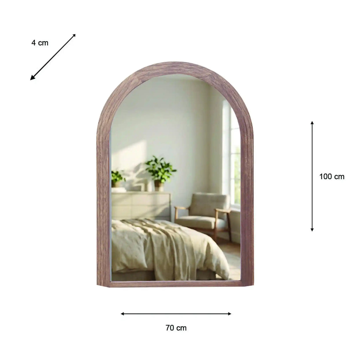 Tara Lane Stepped Arched Wall Mirror with natural wood frame, 70cm width by 100cm height, reflecting a modern bedroom interior with bed and furnishings