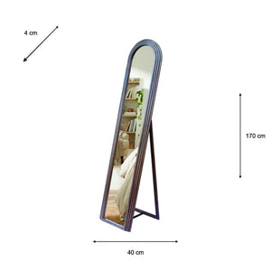 Tara Lane Stepped Arched Floorstanding Mirror with natural wood frame, 40cm width by 170cm height, featuring curved top and black metal stand legs, reflecting interior room with shelving and decor