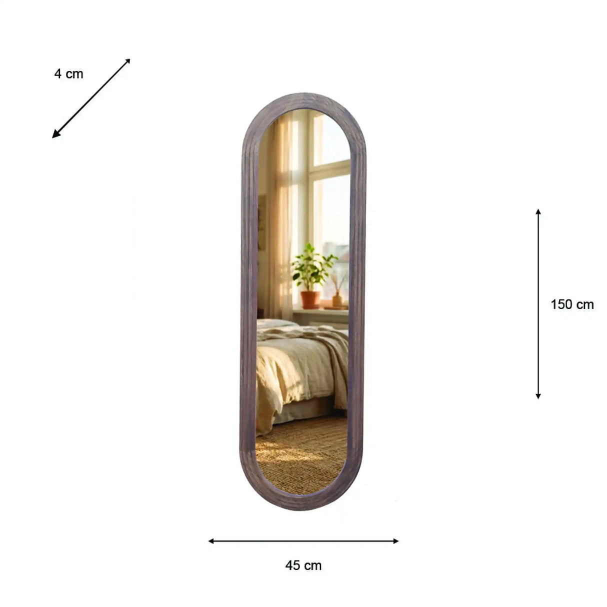 Tara Lane pill shaped dressing mirror with natural wood frame, 45cm wide by 150cm tall, featuring rounded edges and reflecting a bedroom interior with bed and window