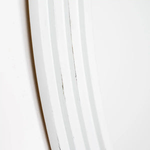 Close-up detail of white ribbed vertical slats showing texture and dimensional grooves on Tara Lane Stepped Round Wall Mirror in oyster finish