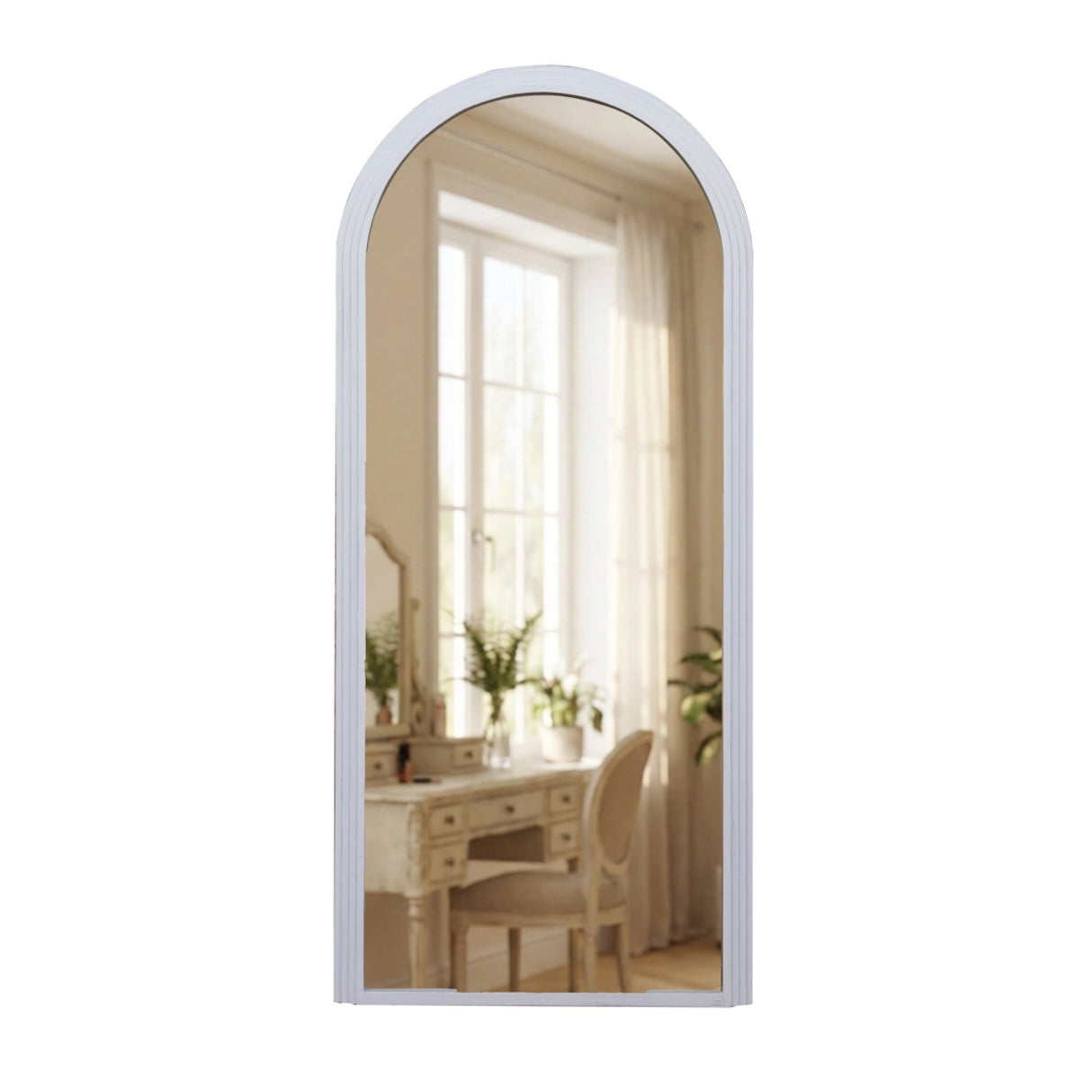Tara Lane oyster white arched leaner mirror 80cm x 180cm reflecting bright room with vanity desk chair and potted plants by window with sheer curtains
