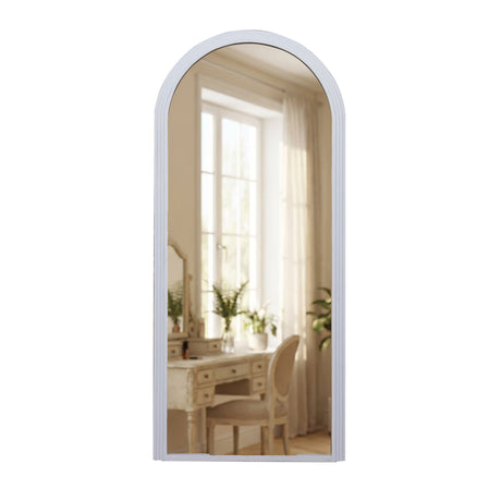 Tara Lane oyster white arched leaner mirror 80cm x 180cm reflecting bright room with vanity desk chair and potted plants by window with sheer curtains