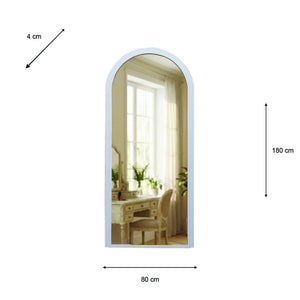 Tara Lane Arched Leaner Mirror in Oyster finish, 80cm wide by 180cm tall, featuring a rounded arch top and light blue frame, leaning against white wall with reflection of bright room interior