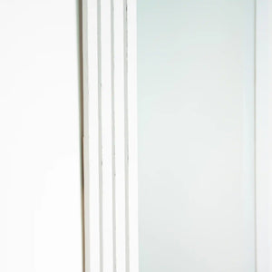 Tara Lane stepped pill shaped dressing mirror with oyster frame, 45cm x 150cm, featuring vertical ribbed details on left side against white background