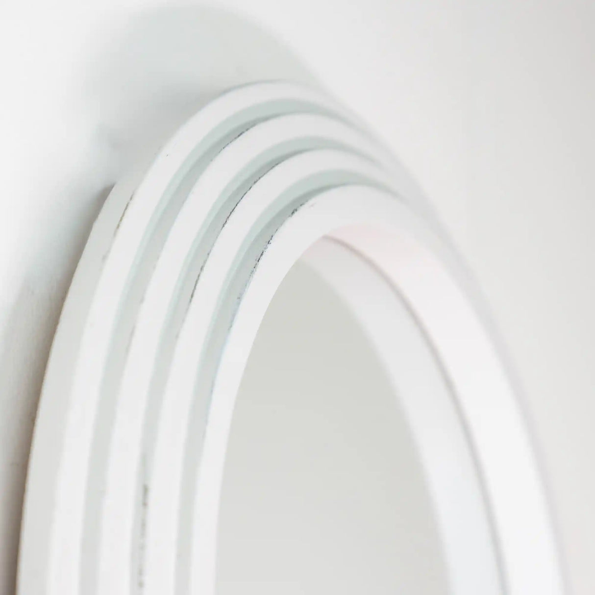Tara Lane Stepped Pill Shaped Dressing Mirror 45cm x 150cm in Oyster finish showing white curved frame with layered stepped design against neutral background