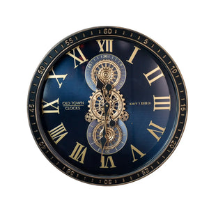 Large black wall clock with gold Roman numerals and exposed brass gears mechanism, Old Town Clocks Est 1883 design, 50cm diameter with decorative outer bezel