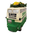 Ceramic double-decker bus planter in cream and green with yellow flower plant on top, Ireland-themed garden ornament featuring bus number 123 and plant pot design